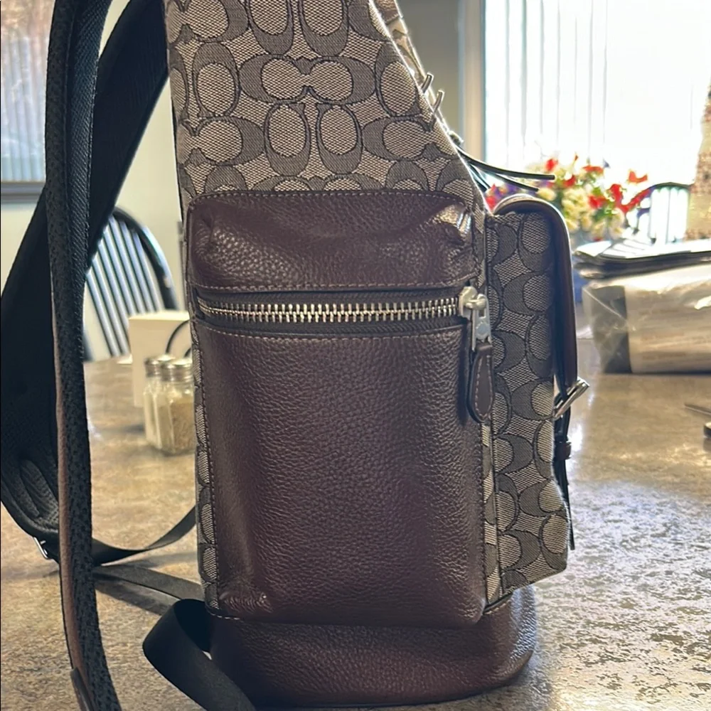 Coach Brown Signature Canvas & Leather Top-Load Backpack. 19” tall 15”wide